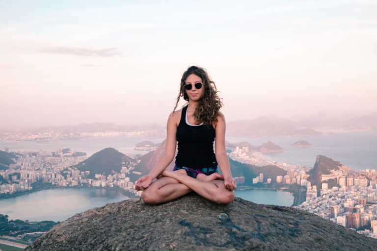 Yoga on top of the mounttain Dois Irmaos overseeing the city of Rio de Janeiro
