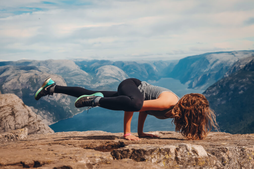 yoga asana at mountain top